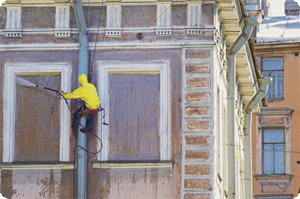 pressure washing employees in action